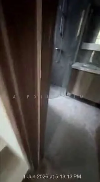 Bathroom features: grey tiled walls, light grey flooring, single-sink vanity with wood cabinet, mirror above vanity, shower area with glass enclosure, chrome shower head, built-in shelving, natural light from window; style: modern.