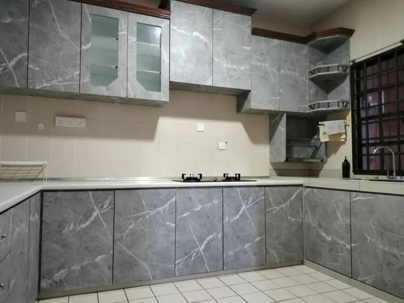 Kitchen features: grey marble-patterned cabinetry, stainless-steel countertop, built-in gas hob with two burners, sink with faucet, wall-mounted shelves, tile backsplash, white tiled flooring, window with security bars; style: modern.