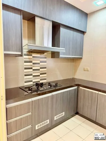 Kitchen features: laminate cabinetry in grey, stainless-steel range hood, 4-burner gas hob, black granite countertop, backsplash with striped tile pattern, built-in oven, under-cabinet lighting, white tiled flooring, wall-mounted cabinets, drawer storage; style: modern.