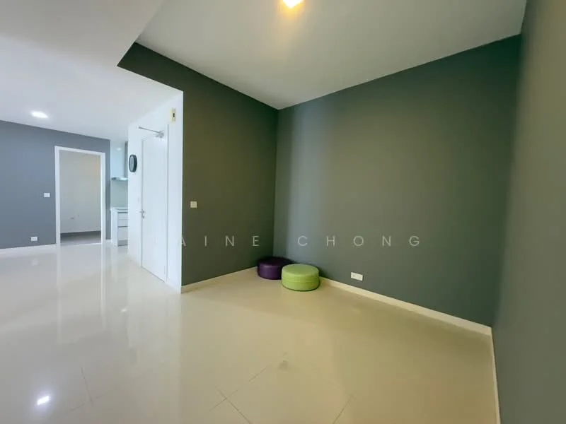 Room features: grey painted walls, glossy tile flooring, recessed downlights, two round poufs in green and purple, white door, white baseboards; style: modern.