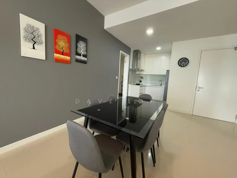 Dining features: black glass dining table, 4 upholstered dining chairs in grey, grey painted walls, framed artwork on walls, recessed ceiling lights, tile flooring, open layout to kitchen, wall clock; style: modern. Kitchen features: white cabinetry, stainless-steel appliances, countertop with backsplash, open layout to dining area; style: modern.