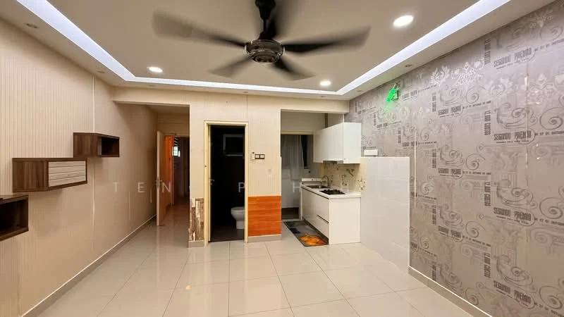 Living features: white painted walls, grey accent wall with decorative pattern, glossy tile flooring, recessed downlights, 5-blade ceiling fan, open layout, kitchen area visible, wall-mounted shelves, doorway leading to other rooms; style: modern. Kitchen features: white cabinetry, stainless-steel sink, gas stove, tile backsplash, countertop space, refrigerator visible; style: modern.