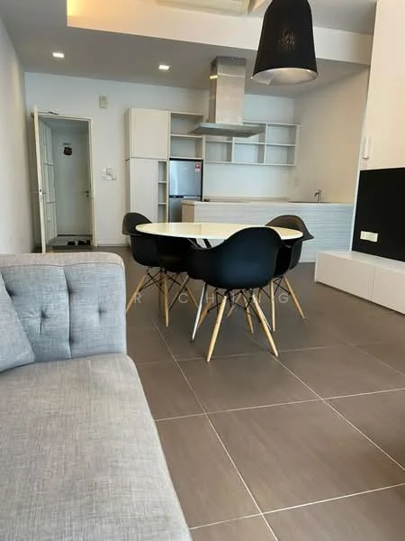 Dining features: round dining table, 4 black dining chairs with wooden legs, pendant light fixture, grey tiled flooring, white cabinetry, stainless-steel fridge, kitchen countertop, open kitchen layout; style: modern. Living features: grey fabric sofa, light grey wall, TV console, open space layout; style: modern.