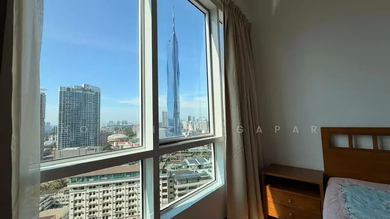 Room features: floor-to-ceiling windows, curtains, wooden bed frame, nightstand, city skyline view, light-colored walls, carpeted flooring; style: modern; view: city.