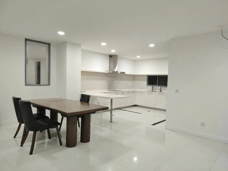 Kitchen features: white cabinetry, marble countertop, stainless-steel sink, chrome pull-down faucet, built-in oven, freestanding range oven, ceramic tile flooring, recessed downlights, open layout, island counter, window with view, dining table with wooden legs, black upholstered dining chairs; style: modern.