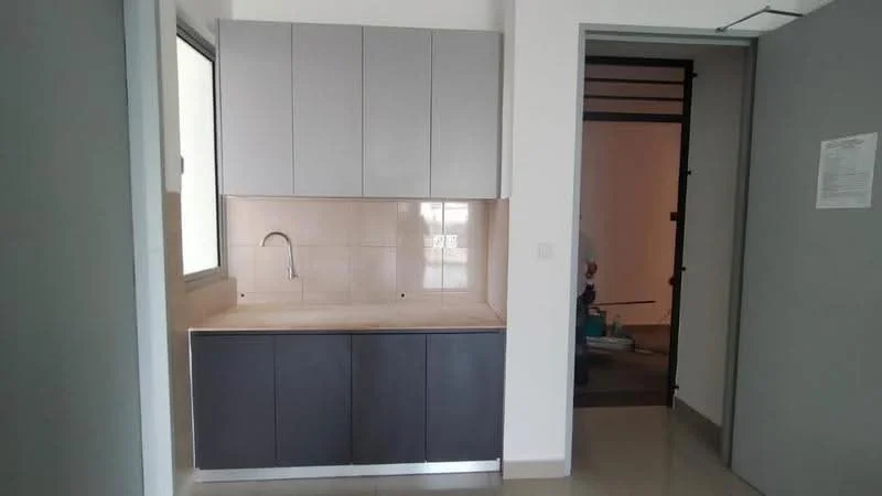Kitchen features: grey upper cabinets, dark lower cabinets, single-bowl stainless-steel sink, chrome faucet, light-colored countertop, tile backsplash, floor-to-ceiling windows, neutral wall color, ceramic tile flooring; style: modern.