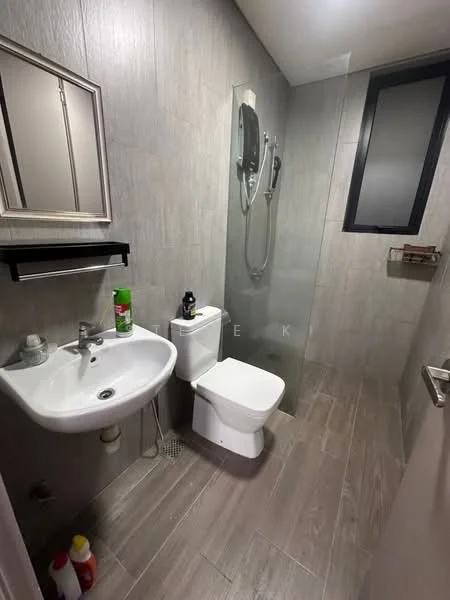 Bathroom features: grey tiled walls, light grey tiled flooring, single-sink vanity with mirror, chrome basin mixer faucet, one-piece toilet, walk-in shower with glass enclosure, handheld shower, wall-mounted shower head, towel rack, window for natural light; style: modern.