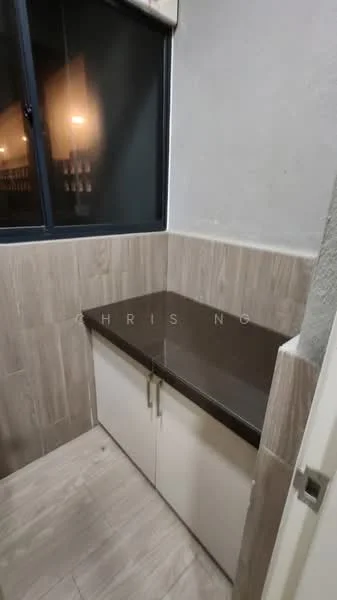 Laundry features: brown granite countertop, white cabinetry with two doors, grey tiled walls, light grey tiled flooring, window with dark frame; style: modern.