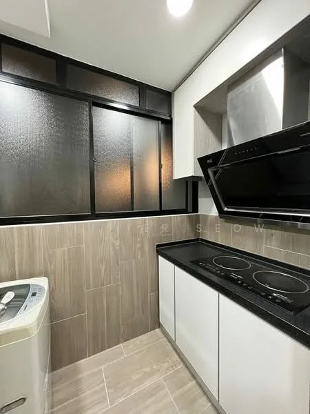 Kitchen features: black countertop, white cabinetry, built-in induction cooktop, stainless-steel range hood, grey tiled backsplash, light grey tile flooring, washing machine, large window with frosted glass, recessed lighting; style: modern.