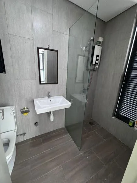 Bathroom features: grey tiled walls, glass shower enclosure, single-sink vanity with wall-mounted faucet, mirror above sink, one-piece toilet, shower with handheld showerhead, dark wood-look tile flooring, wall-mounted water heater; style: modern.