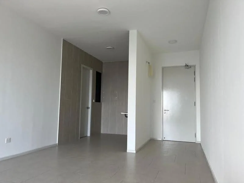 Room features: white painted walls, light grey tiled flooring, single door, recessed ceiling lights, open layout, neutral color scheme, corner wall with textured finish, no visible furniture; style: modern.