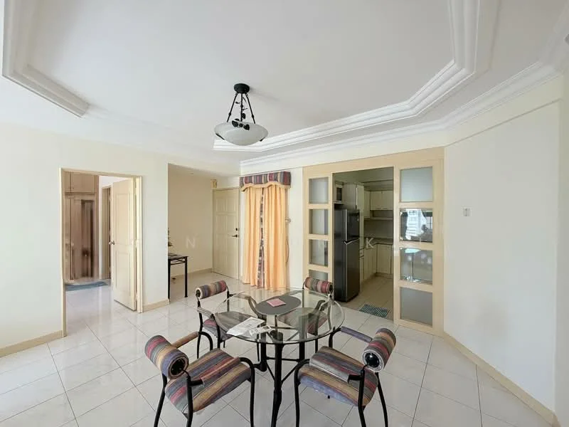 Dining features: round glass dining table, 4 upholstered dining chairs with striped pattern, white painted walls, ceramic tile flooring, tray ceiling with decorative moulding, ceiling light fixture, sliding glass door leading to kitchen, curtains in beige, built-in cabinetry with glass doors, doorway leading to hallway; style: modern. Kitchen features: white cabinetry, stainless-steel fridge, built-in oven, countertop with backsplash, ceramic tile flooring. Room features: doorway leading to another room, wooden door.