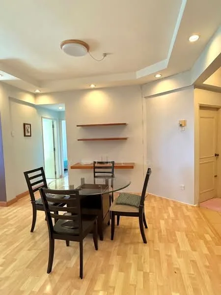 Dining features: round glass dining table, 4 black wooden dining chairs, light wood flooring, white painted walls, recessed downlights, tray ceiling, open shelving unit on wall, doorway leading to another room; style: modern.