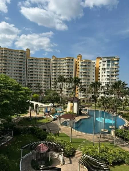 Exterior type: high-rise condominium; features: swimming pool with water features, landscaped garden with palm trees, children's playground, BBQ pit area, manicured lawns, multiple outdoor seating areas, walkways with stone paving, surrounding greenery, multiple storeys, balconies on each unit; style: modern.