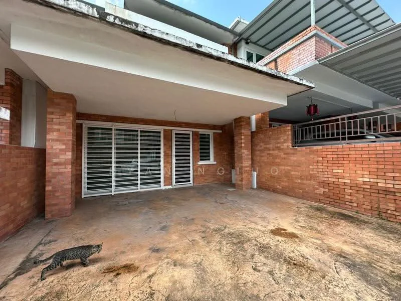 Exterior type: linked terrace house; features: red brick facade, covered porch area, concrete flooring, sliding glass door, metal railing, overhead roof, exposed brick walls, open space, surrounded by low walls; style: modern.