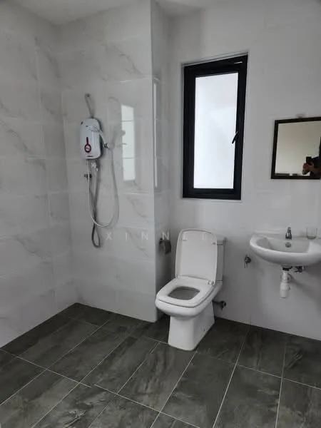 Bathroom features: white ceramic toilet, wall-mounted basin, chrome faucet, mirror above basin, shower area with wall-mounted showerhead, grey marble tile flooring, white tiled walls, window for natural light; style: modern.