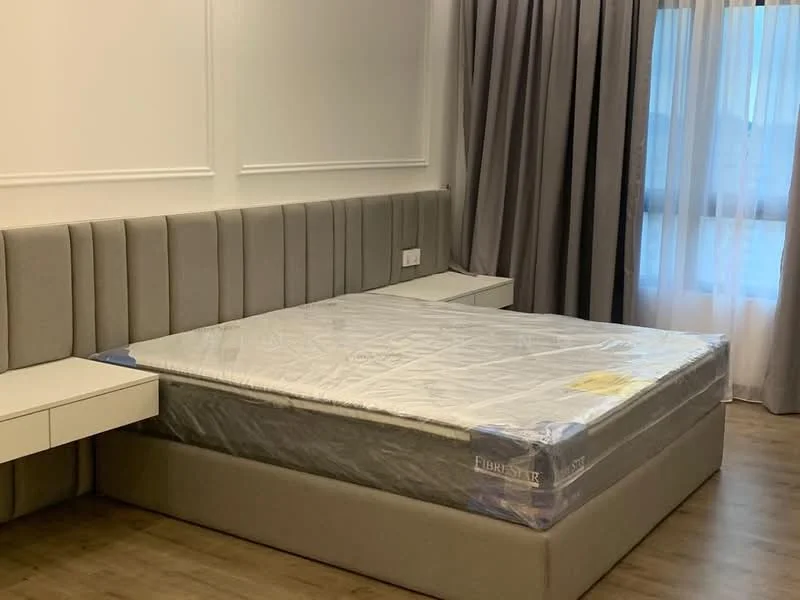 Bedroom features: king-size bed, upholstered headboard, bedside tables with drawers, grey fabric wall paneling, floor-to-ceiling windows, sheer curtains, wooden flooring, decorative wall molding; style: modern.