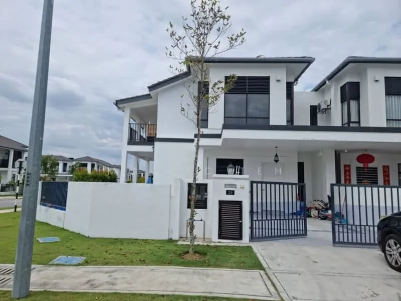 Exterior type: semi-detached house; features: white painted facade, flat roof, double-storey, manicured lawn, paved driveway, metal gate, balcony on upper floor, decorative wall lantern, surrounded by greenery, visible neighboring houses; style: modern.