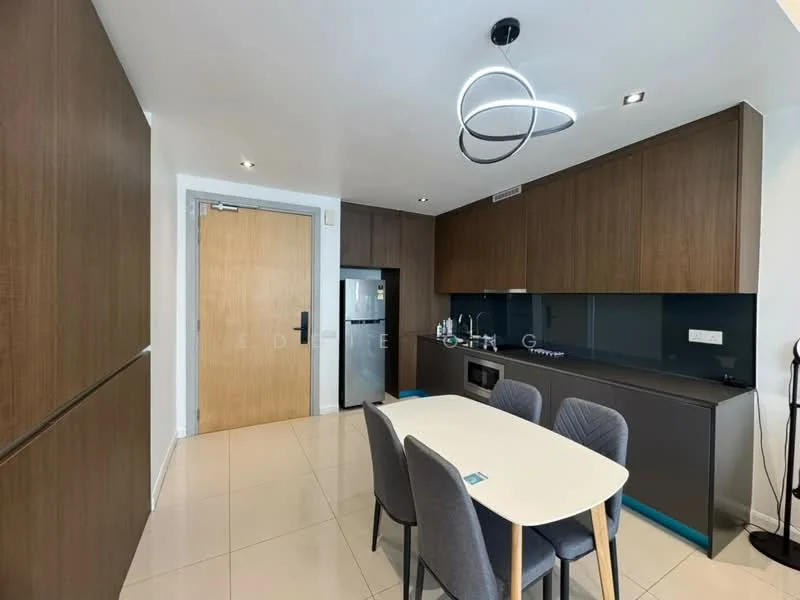 Kitchen features: brown wooden cabinetry, black countertop, built-in oven, stainless-steel fridge, induction hob, single-bowl stainless-steel sink, chrome pull-down faucet, pendant light fixture, dining table with white surface, 4 grey upholstered dining chairs, tile flooring, recessed downlights; style: modern.