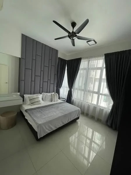 Bedroom features: king-size bed with white bedding, upholstered headboard, 2 bedside pillows, ceiling fan with 5 blades, floor-to-ceiling windows, sheer curtains, blackout curtains, grey accent wall, white painted walls, glossy tile flooring, dressing table with mirror, decorative wall paneling, small round stool; style: modern.