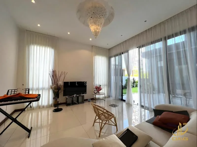 Living features: white painted walls, glossy tile flooring, chandelier, floor-to-ceiling windows, sheer curtains, sofa with cushions, coffee table, TV console, decorative plants, musical keyboard, area rug; style: modern; view: garden.