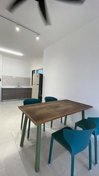 Dining features: wooden dining table, 4 green plastic dining chairs, white painted walls, tile flooring, recessed LED downlights, ceiling fan, kitchen area visible in background, stainless-steel fridge visible in background; style: modern.