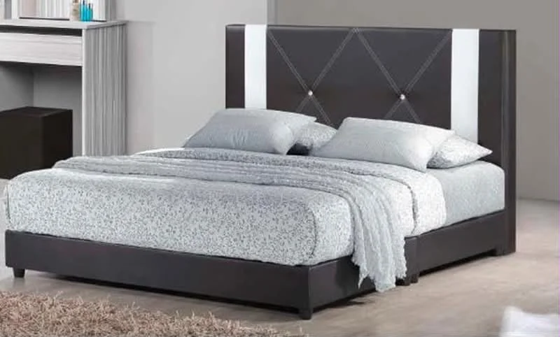 Bedroom features: king-size bed, upholstered headboard with diamond tufting, grey bedding with floral pattern, light grey throw blanket, wooden bed frame in dark finish, laminate flooring, decorative area rug, nightstand with drawer, wall-mounted shelf, neutral wall color; style: modern.