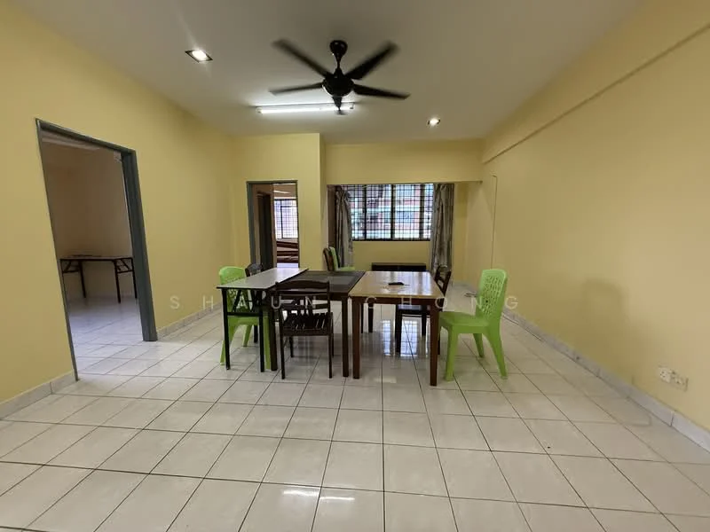 Dining features: square dining table, 4 wooden dining chairs, 2 green plastic chairs, white tiled flooring, yellow painted walls, ceiling fan with light, window with grid pattern, light fixtures in ceiling.