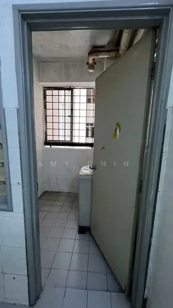 Laundry features: white tiled walls, grey tiled flooring, window with metal grille, washing machine, door leading to another room.