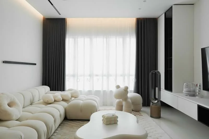 Living features: curved white fabric sofa, white coffee table with organic shape, floor-to-ceiling windows, sheer curtains, dark grey blackout curtains, decorative plush bear, decorative plush pillow, wall-mounted TV, light wood cabinetry, modern air purifier, recessed ceiling lights, neutral-toned area rug; style: modern; view: city.