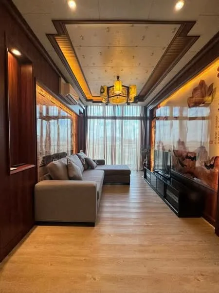 Living features: grey fabric sofa, wooden coffee table, wall-mounted TV, black TV console, wood paneling, recessed ceiling lights, chandelier, floor-to-ceiling windows with sheer curtains, laminate flooring, decorative wall art, air conditioning unit; style: modern; view: city.