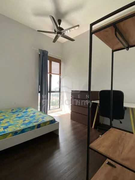 Bedroom features: queen-size bed with blue and yellow bedding, wooden flooring, 5-blade ceiling fan, large window with sheer curtains, desk with wooden top and black chair, brown wooden dresser, decorative wall with light grey paint; style: modern; view: city.