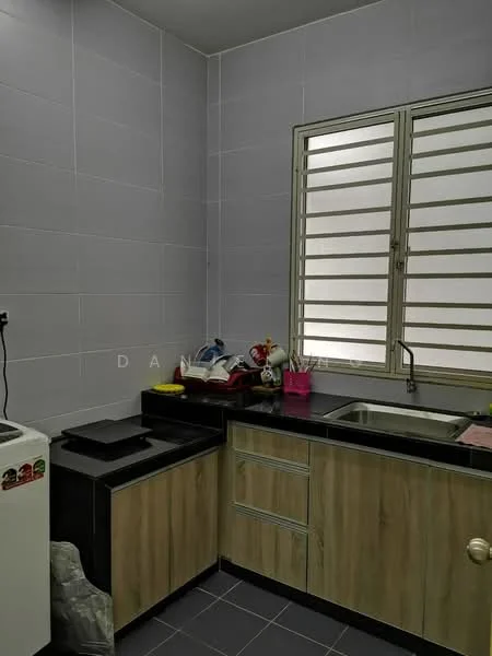 Kitchen features: grey tiled walls, black countertop, wood cabinetry, stainless-steel sink, chrome faucet, sliding window, white washing machine, black stove, grey tiled flooring; style: modern.