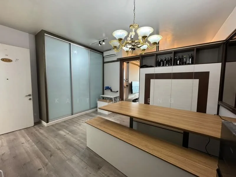 Dining features: wooden dining table, upholstered dining chairs, chandelier with multiple bulbs, built-in cabinetry, glass sliding doors, light wood paneling, grey accent wall, laminate flooring; style: modern.