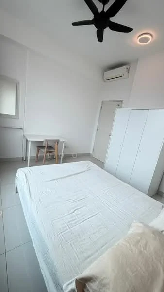 Bedroom features: white painted walls, grey tiled flooring, 5-blade ceiling fan, wall-mounted split AC, queen-size bed with white bedding, built-in wardrobe with sliding doors, study desk with wooden legs and white top, chair with wooden legs, window with natural light, decorative pillow on bed; style: minimalist.