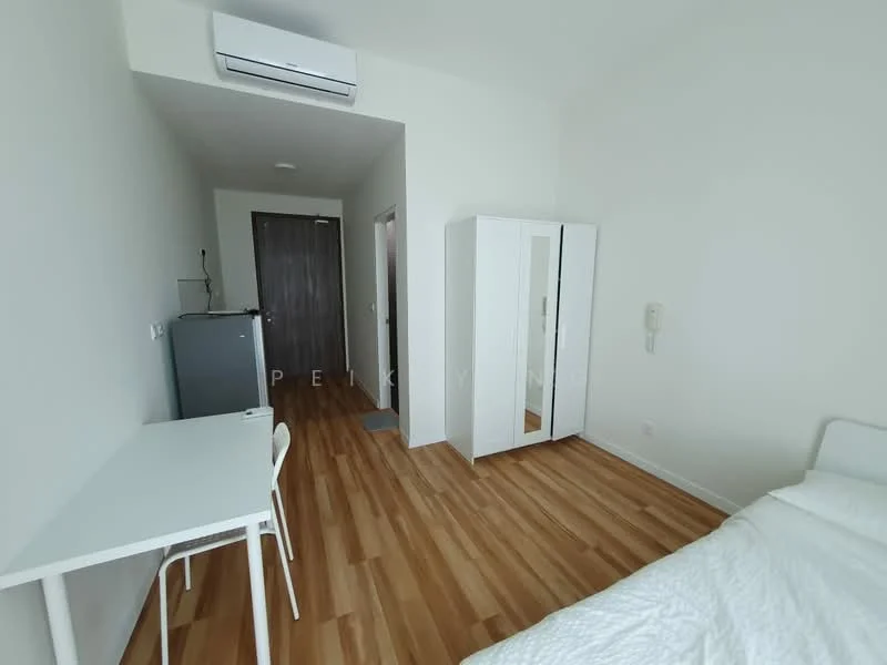 Bedroom features: wooden flooring, white painted walls, 1 wall-mounted split AC, single bed, white bedding, study desk with white finish, white chair, mirror-front wardrobe, grey fridge, door leading to hallway; style: modern.