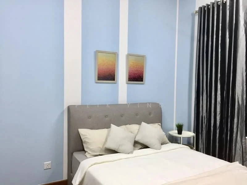 Bedroom features: light blue painted walls, grey upholstered headboard, white bedding, decorative pillows, small round side table, framed artwork on walls, floor-to-ceiling curtains in black and silver, wooden flooring, houseplant in ceramic pot; style: modern.