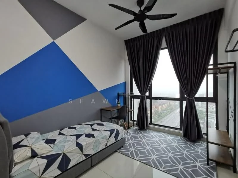 Bedroom features: queen-size bed with patterned bedding, geometric accent wall in blue and grey, floor-to-ceiling window, blackout curtains, ceiling fan, study desk, metal frame chair, area rug with geometric pattern, laminate flooring; style: modern; view: city.