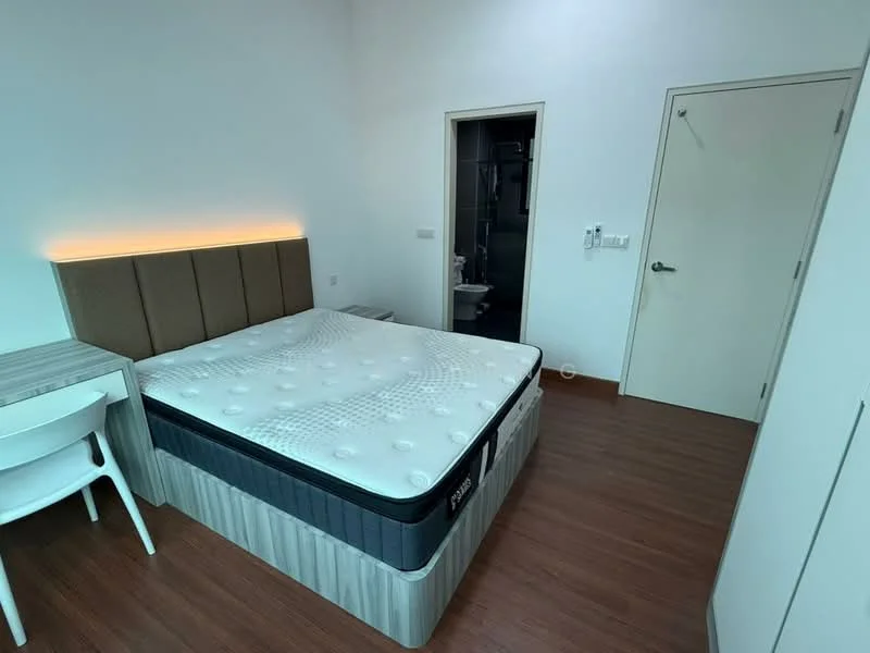 Bedroom features: queen-size bed with mattress, upholstered headboard, wooden flooring, white painted walls, desk with chair, built-in wardrobe, door to bathroom, light fixture on wall; style: modern.