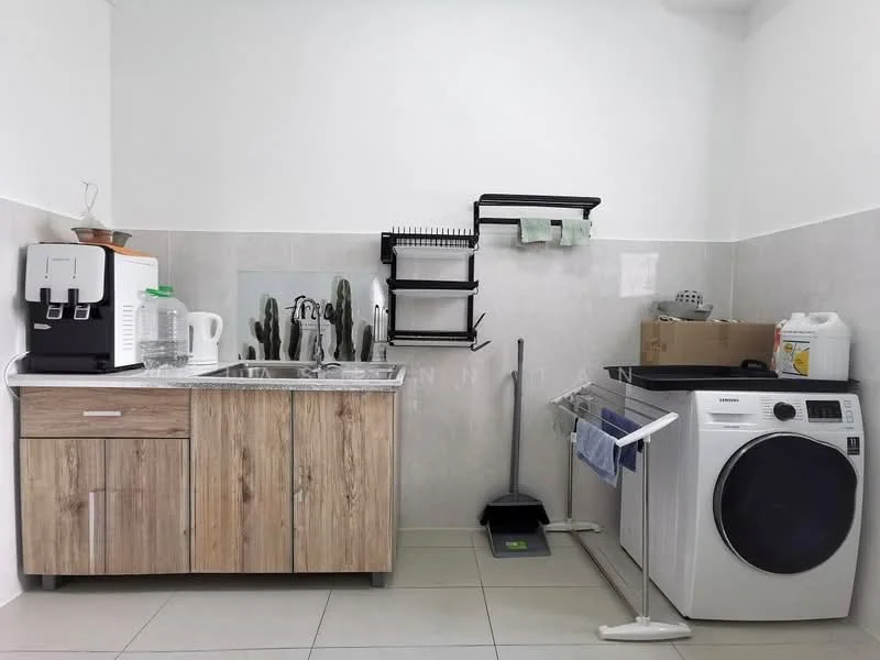 Laundry features: single-bowl stainless-steel sink, wooden cabinetry with drawers, white washing machine, wall-mounted drying rack, tile backsplash, grey tiled flooring, countertop with space for appliances, decorative cacti in pot, folding clothes drying rack, cleaning supplies in cardboard box; style: modern.