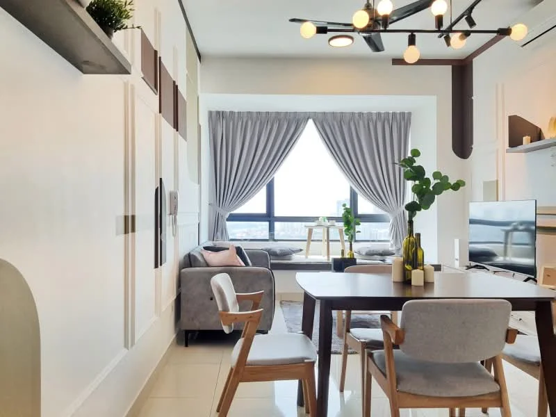 Dining features: dining table with four chairs, grey upholstered chairs, wooden dining table, decorative plant in vase, white walls with accent panels, large window with grey curtains, sofa in background, TV console with flat-screen TV, recessed ceiling lights, ceiling light fixture with multiple bulbs; style: modern; view: city.