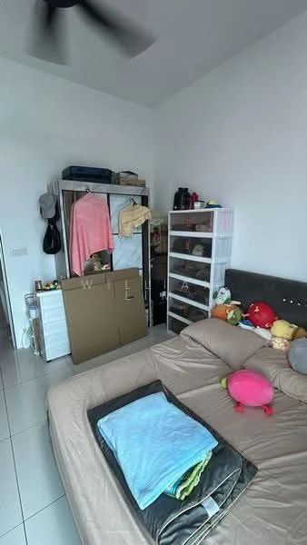 Bedroom features: king-size bed with beige bedding, upholstered headboard, white walls, sliding mirror wardrobe, open shelving unit, decorative plush toys, ceiling fan, tile flooring, window with natural light, bedside items on bed.