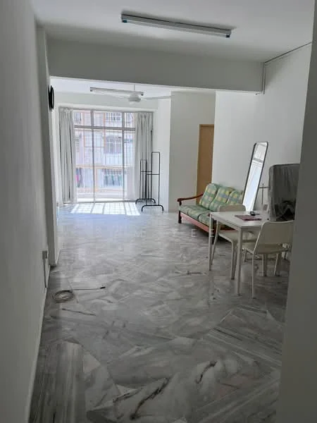 Living features: grey marble flooring, white painted walls, ceiling fan, large floor-to-ceiling windows, sheer curtains, dining table with white chairs, green and yellow patterned sofa, full-length mirror, clothes rack, natural light from windows; style: modern.