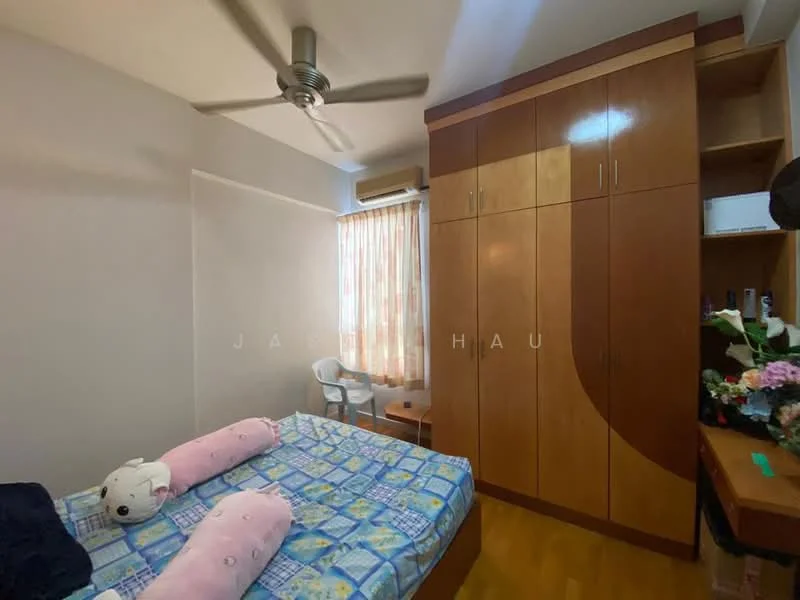 Bedroom features: queen-size bed with blue patterned bedding, 2 pink pillows, wooden wardrobe with sliding doors, study desk with chair, floor-to-ceiling window with sheer curtains, ceiling fan, wooden flooring, decorative plants on desk; style: modern.