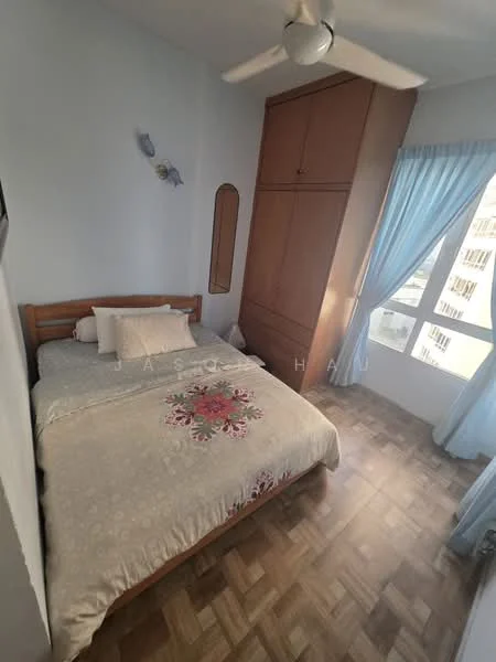 Bedroom features: queen-size bed with floral bedding, wooden bed frame, built-in wardrobe with wooden finish, floor-to-ceiling window, curtains in light blue, ceiling fan, laminate flooring, decorative wall art; style: modern; view: city.