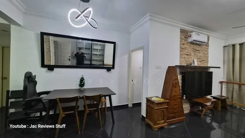 Living features: black tiled flooring, white painted walls, exposed stone feature wall, recessed ceiling with modern light fixture, large wall-mounted mirror, wooden TV cabinet, black television, wooden dining table with four chairs, black office chair, air conditioning unit, curtains, decorative wall art; style: modern.