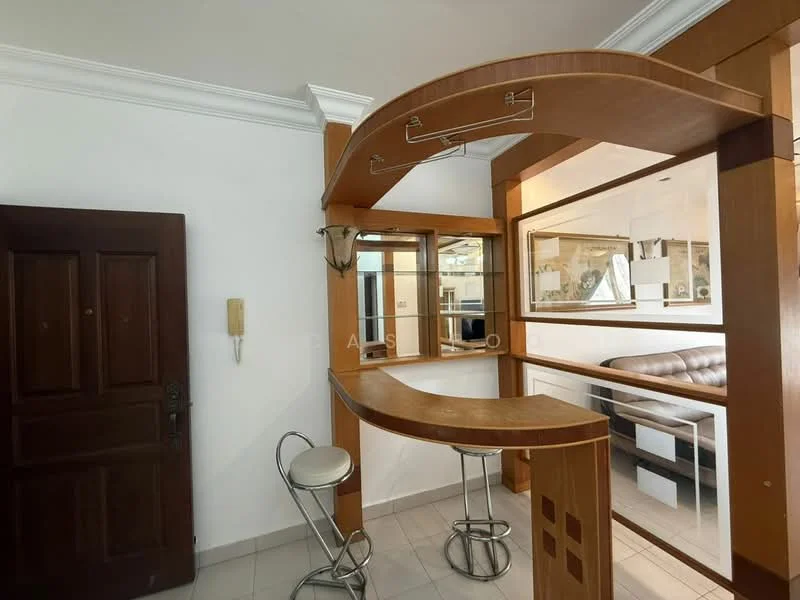 Room features: wooden bar counter, two bar stools, white walls, tile flooring, crown moulding, glass partition, wooden door, light fixture; style: modern.