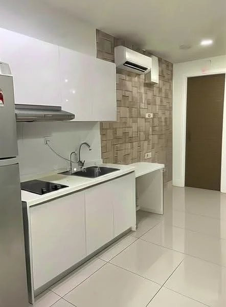 Kitchen features: white glossy cabinetry, stainless-steel sink, chrome pull-down faucet, built-in stove, grey tiled backsplash, white countertop, recessed downlights, wall-mounted split AC, ceramic tile flooring, door leading to hallway; style: modern.