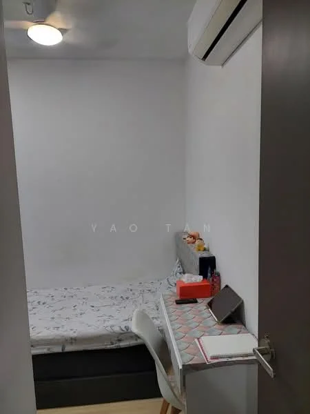 Bedroom features: single bed with floral bedding, white painted walls, wooden flooring, wall-mounted air conditioning unit, desk with patterned surface, white chair, decorative items on desk, window with no visible treatment, light fixture on ceiling; style: modern.