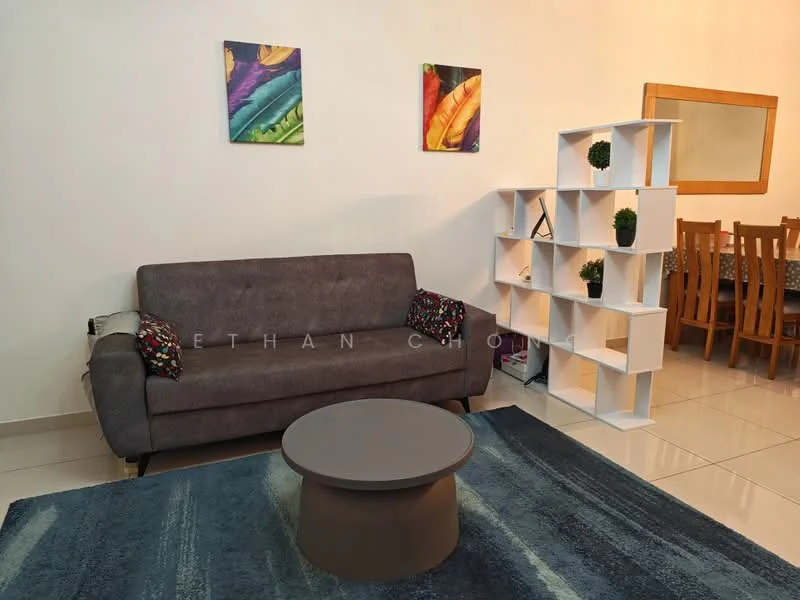 Living features: 3-seater fabric sofa in grey, coffee table with round top, area rug with geometric pattern, decorative wall art with colorful designs, white shelving unit with open compartments, wooden dining table in background, dining chairs, cream painted walls, tile flooring; style: modern.